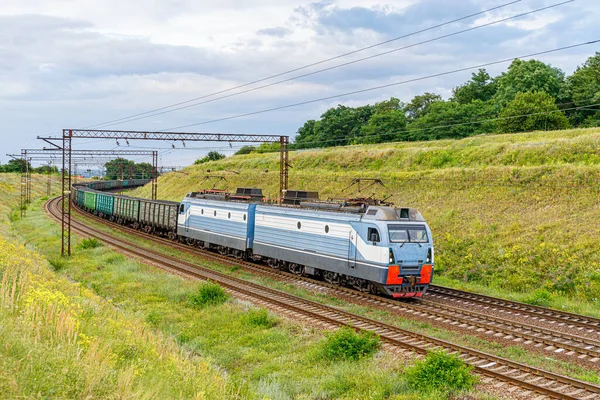 depositphotos_566703028-stock-photo-powerful-gray-electric-locomotive-pulls