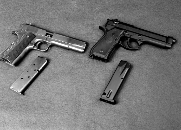 a-right-side-view-of-the-m-1911-45-caliber-pistol-left-and-its-successor-the-a2d550-1024