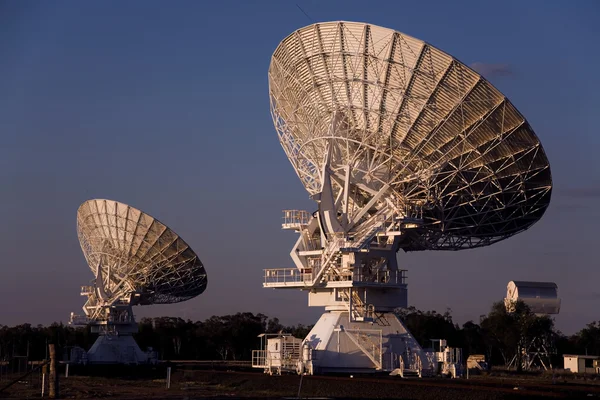depositphotos_9255837-stock-photo-two-compact-array-telescopes